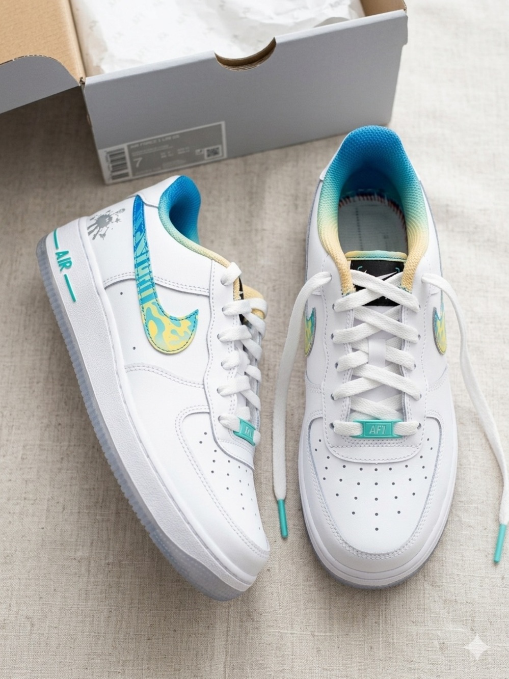 Nike White Sneakers with Teal and Yellow Gradient Swoosh